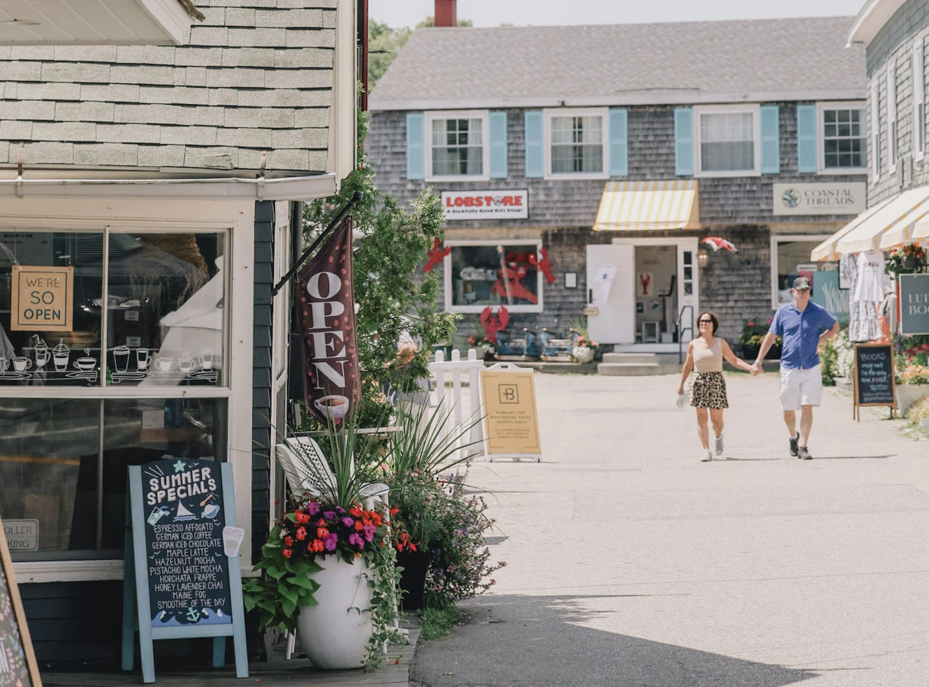 a man and woman walking on a street