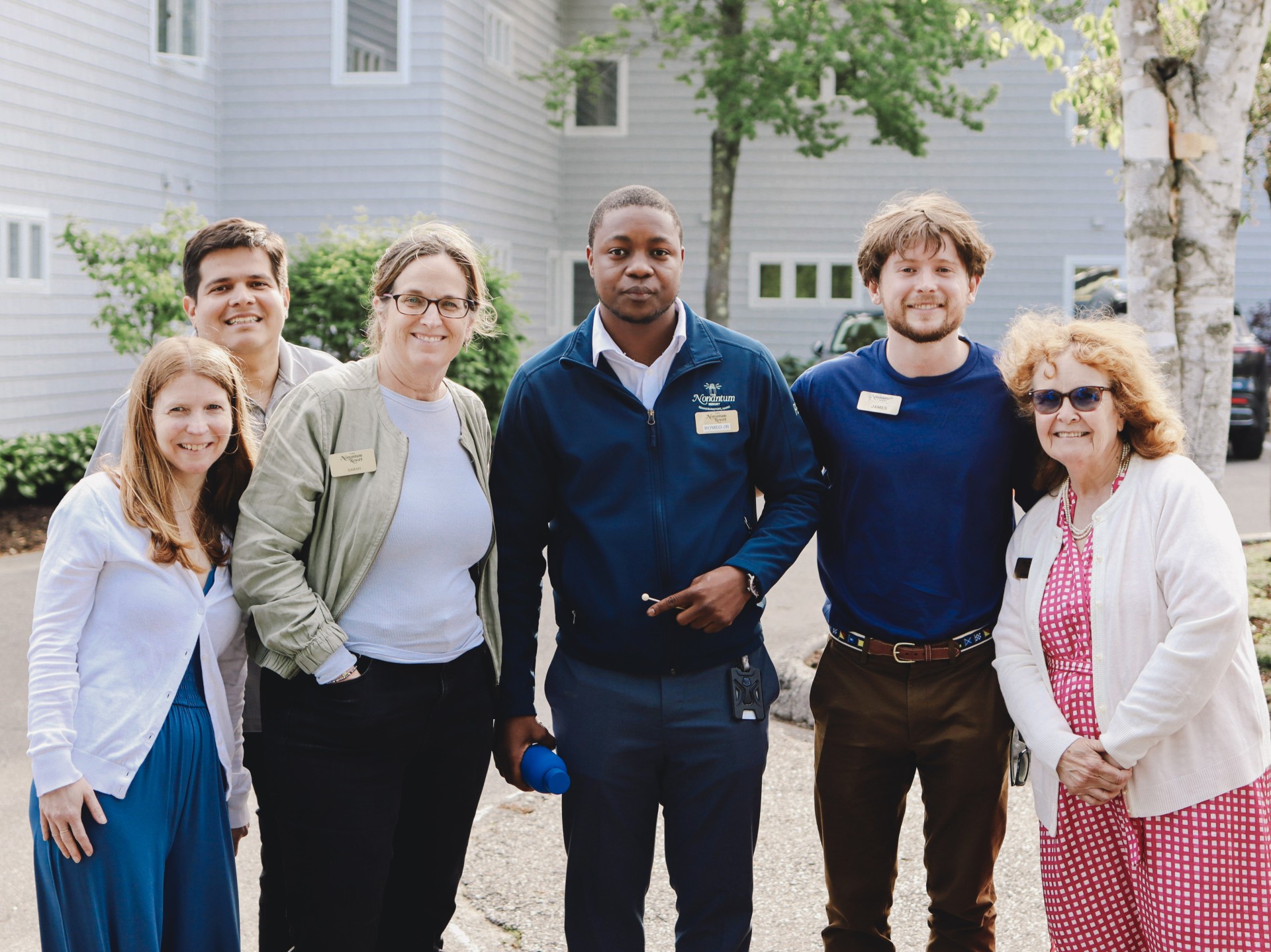 a group of people posing for a photo