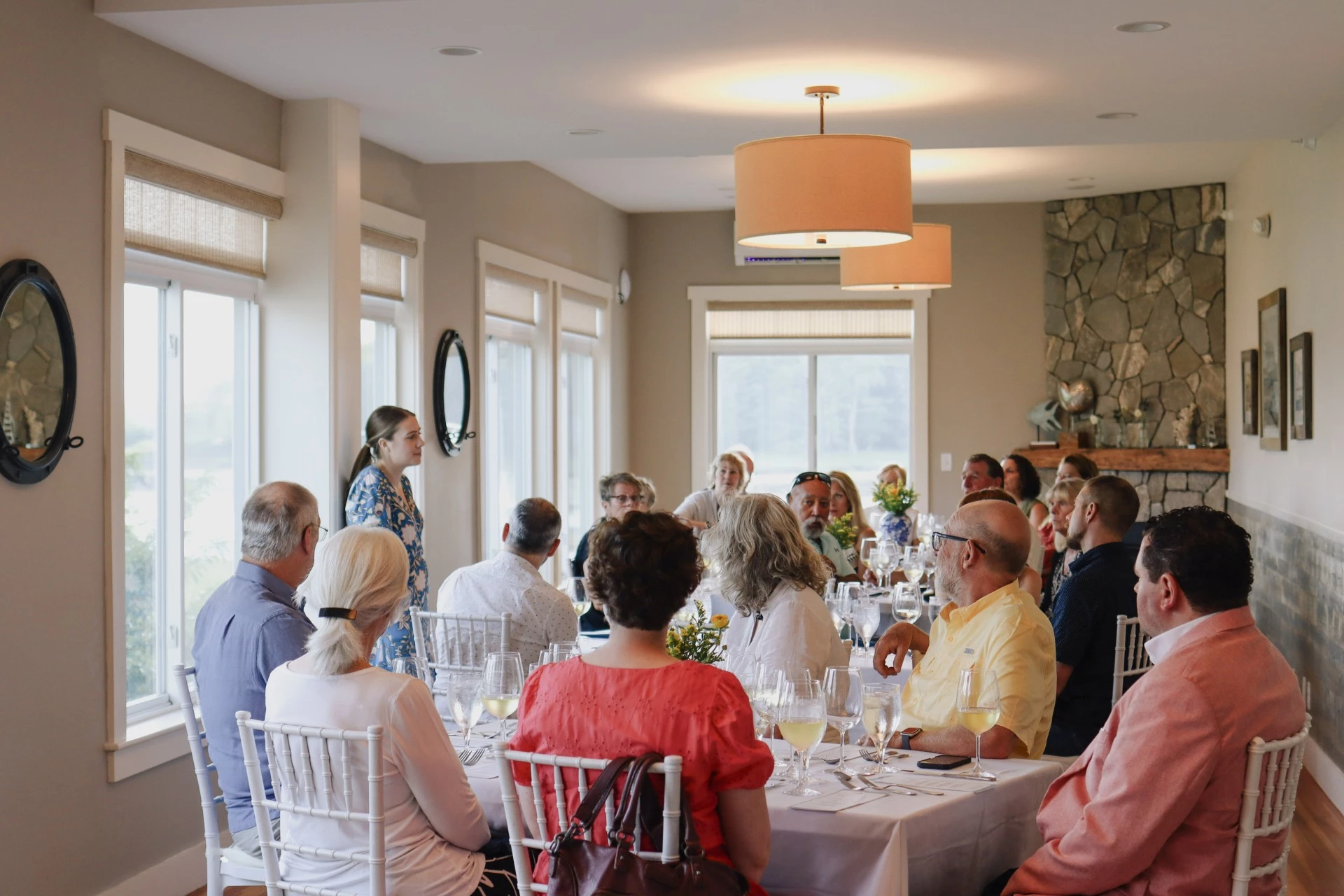 a group of people sitting at tables