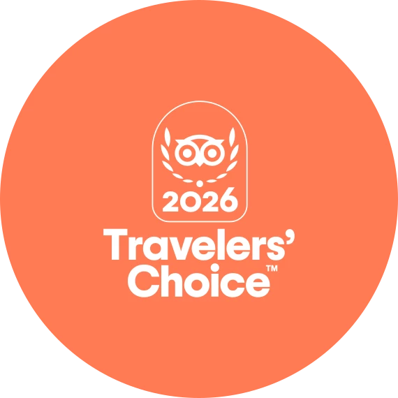 an orange circle with white text and a logo