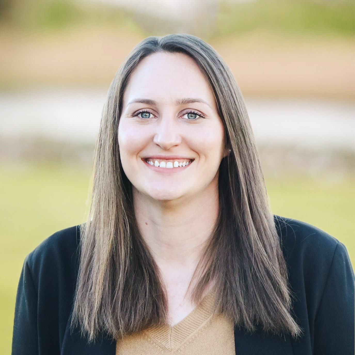 a woman smiling for a picture