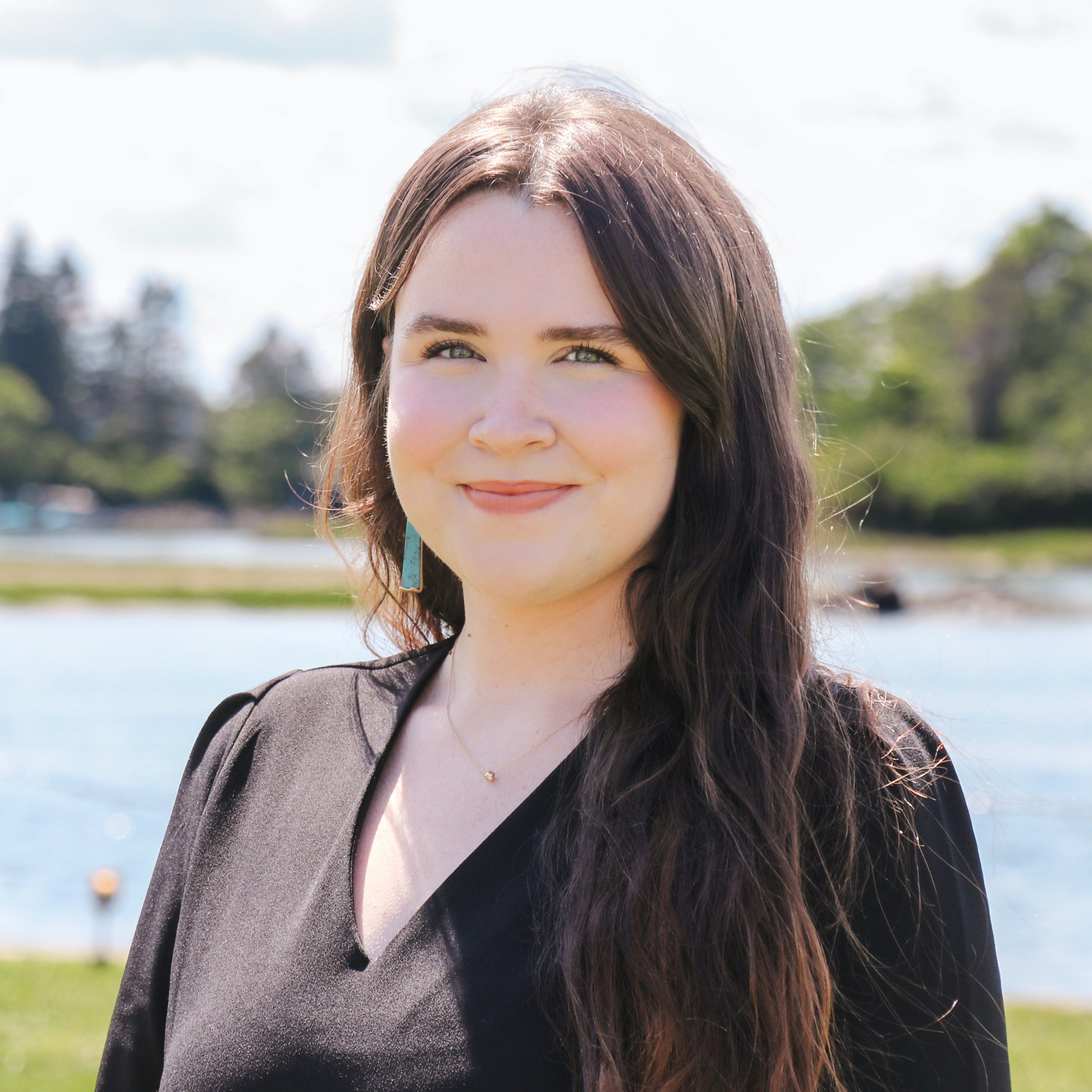 a woman smiling at camera