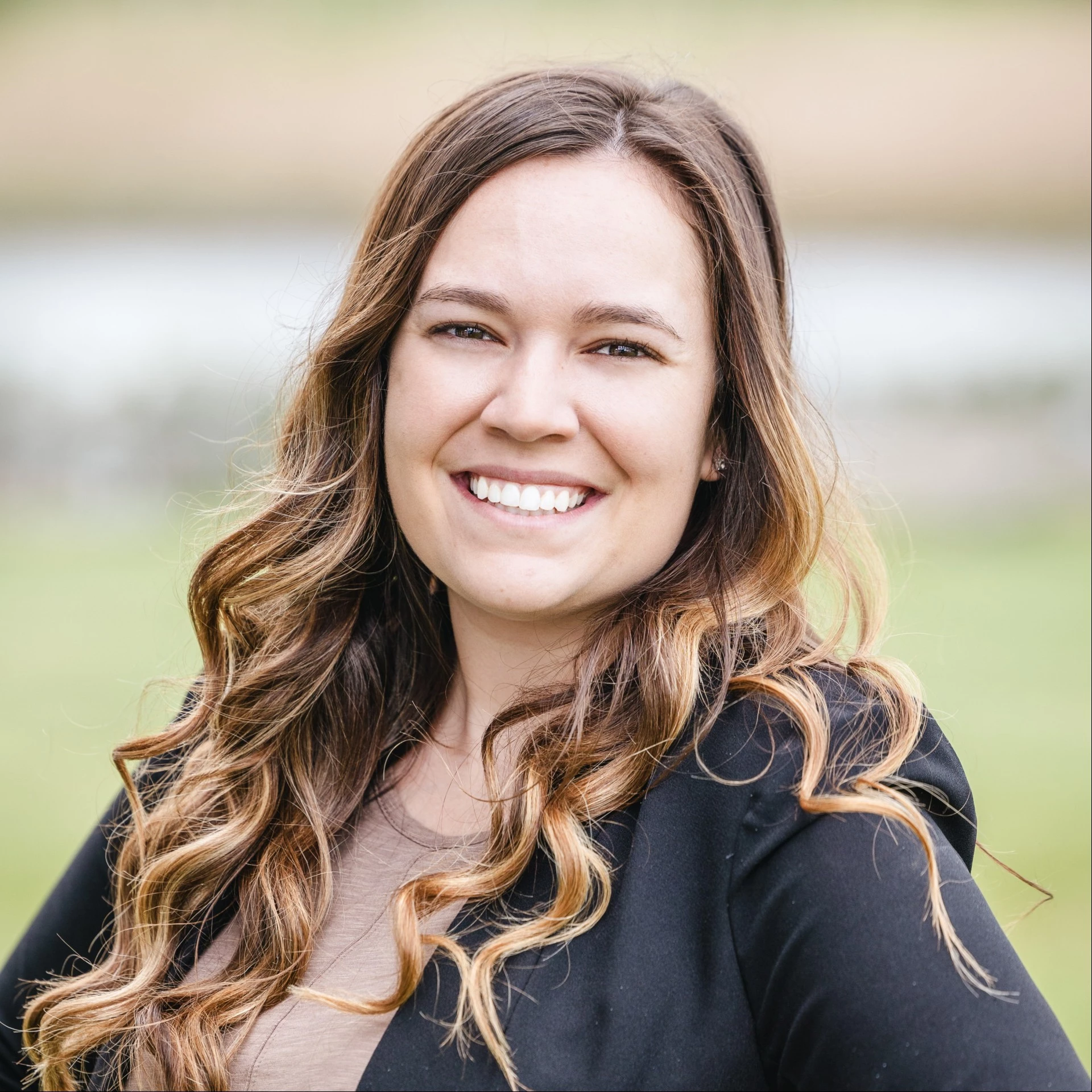 a woman smiling at camera