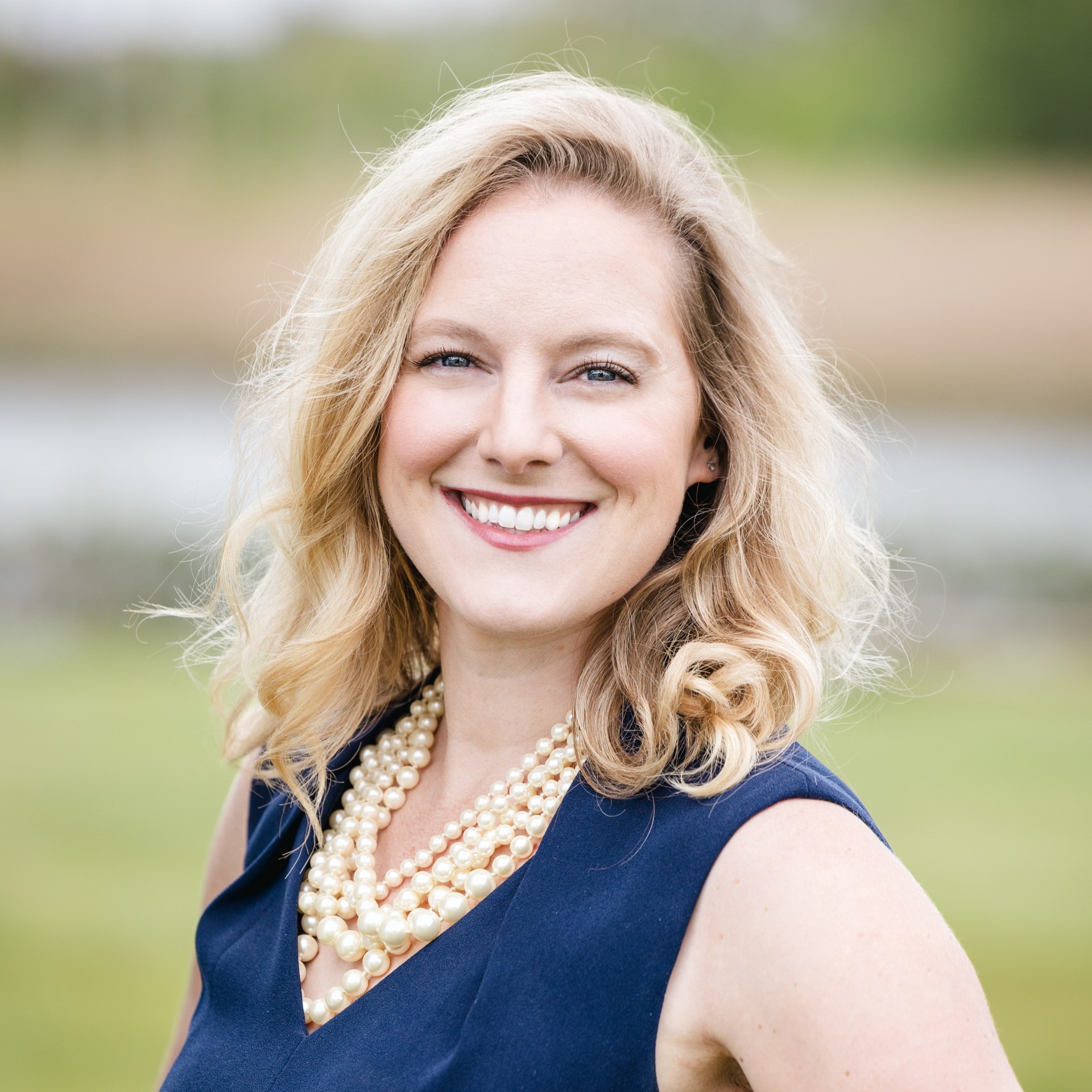 a woman smiling at camera