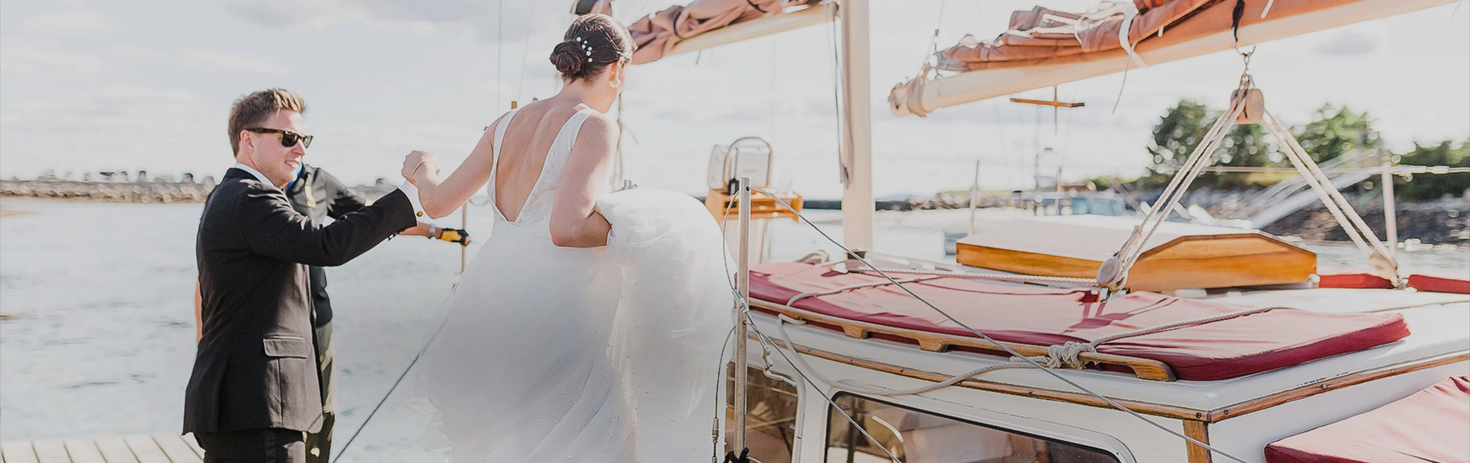 a man and woman in wedding attire