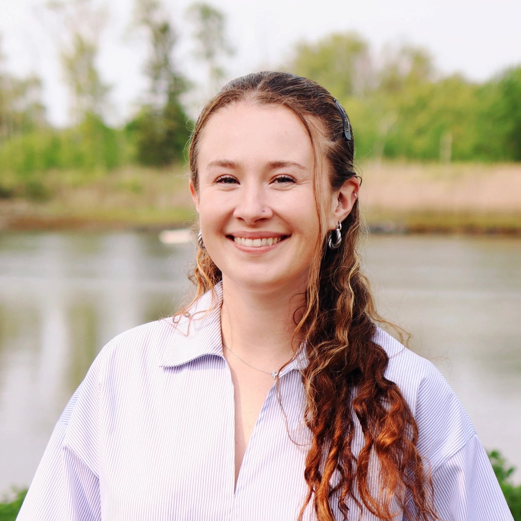 a woman smiling at camera