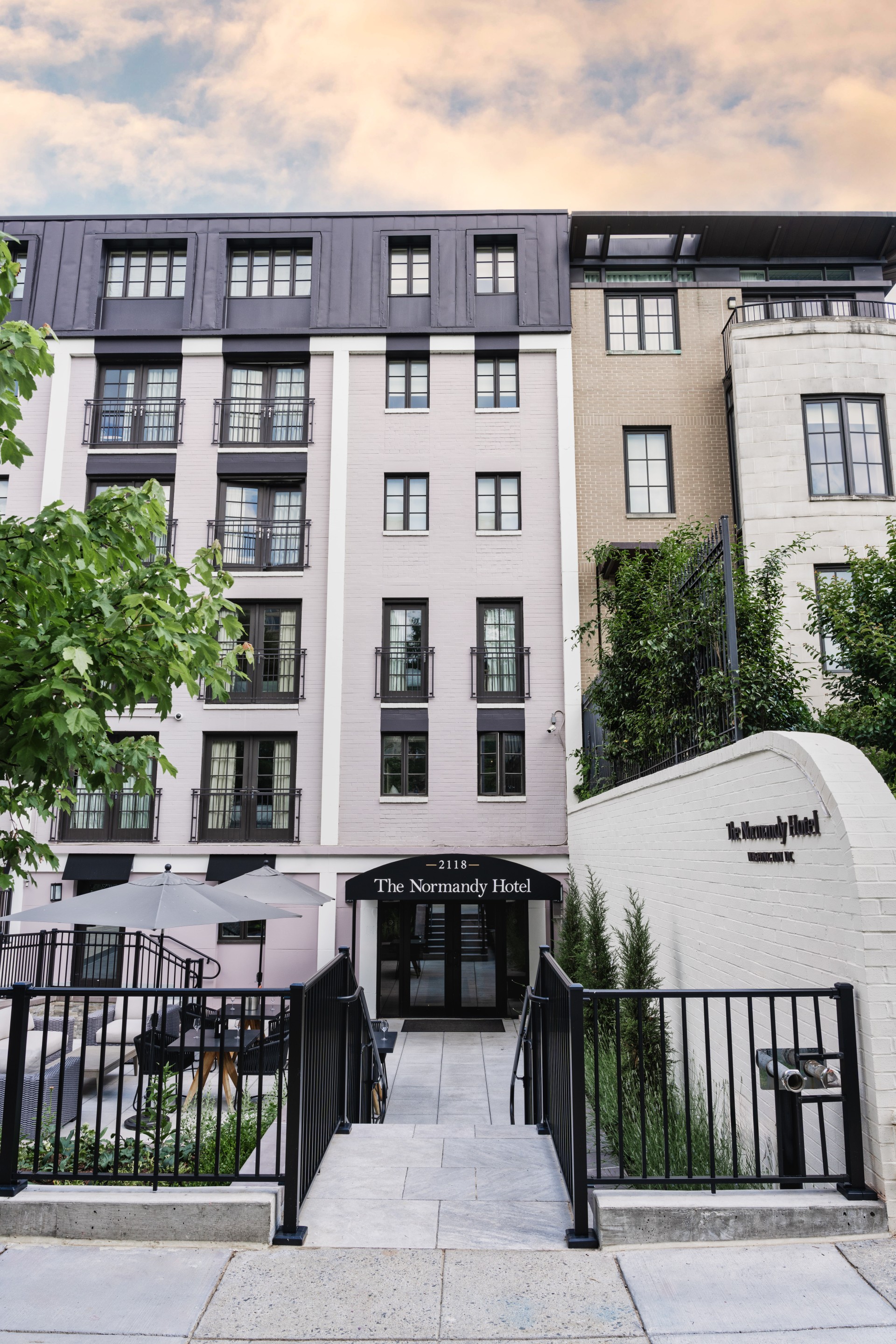 a building with a black railing