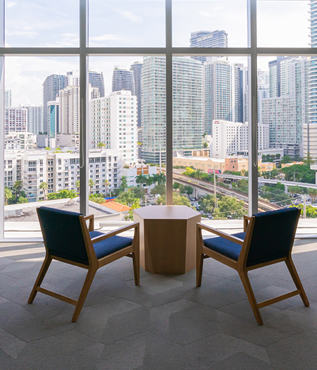 a room with a table and chairs