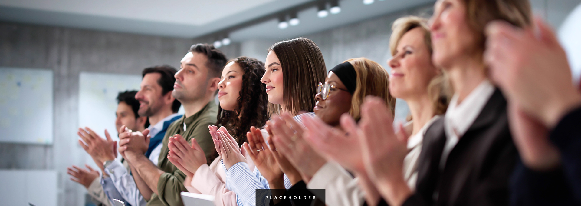 a group of people clapping