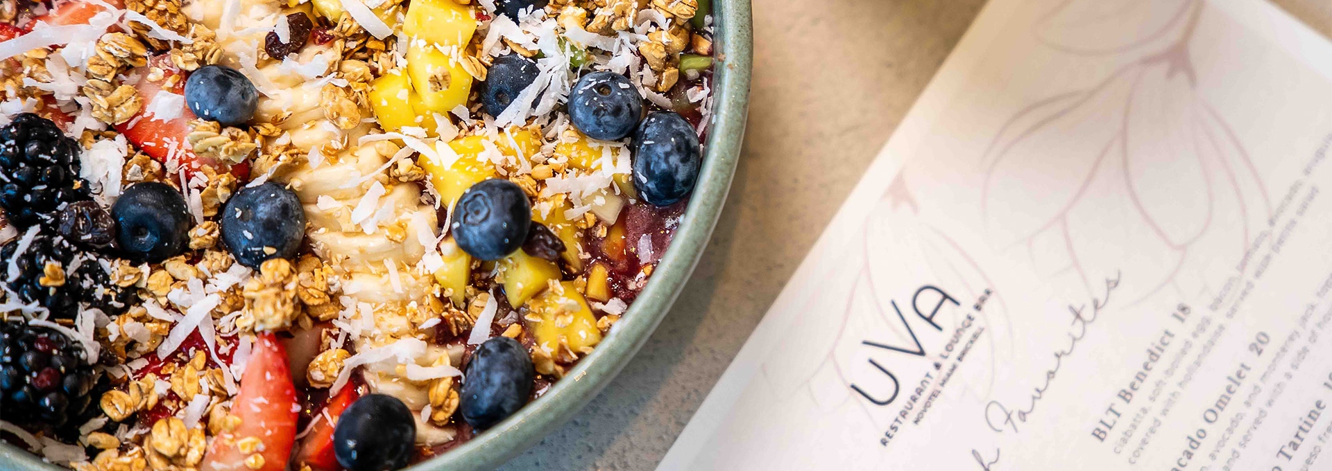 a bowl of fruit and nuts