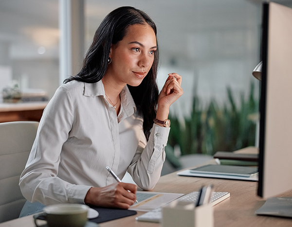 a woman sitting at a desk