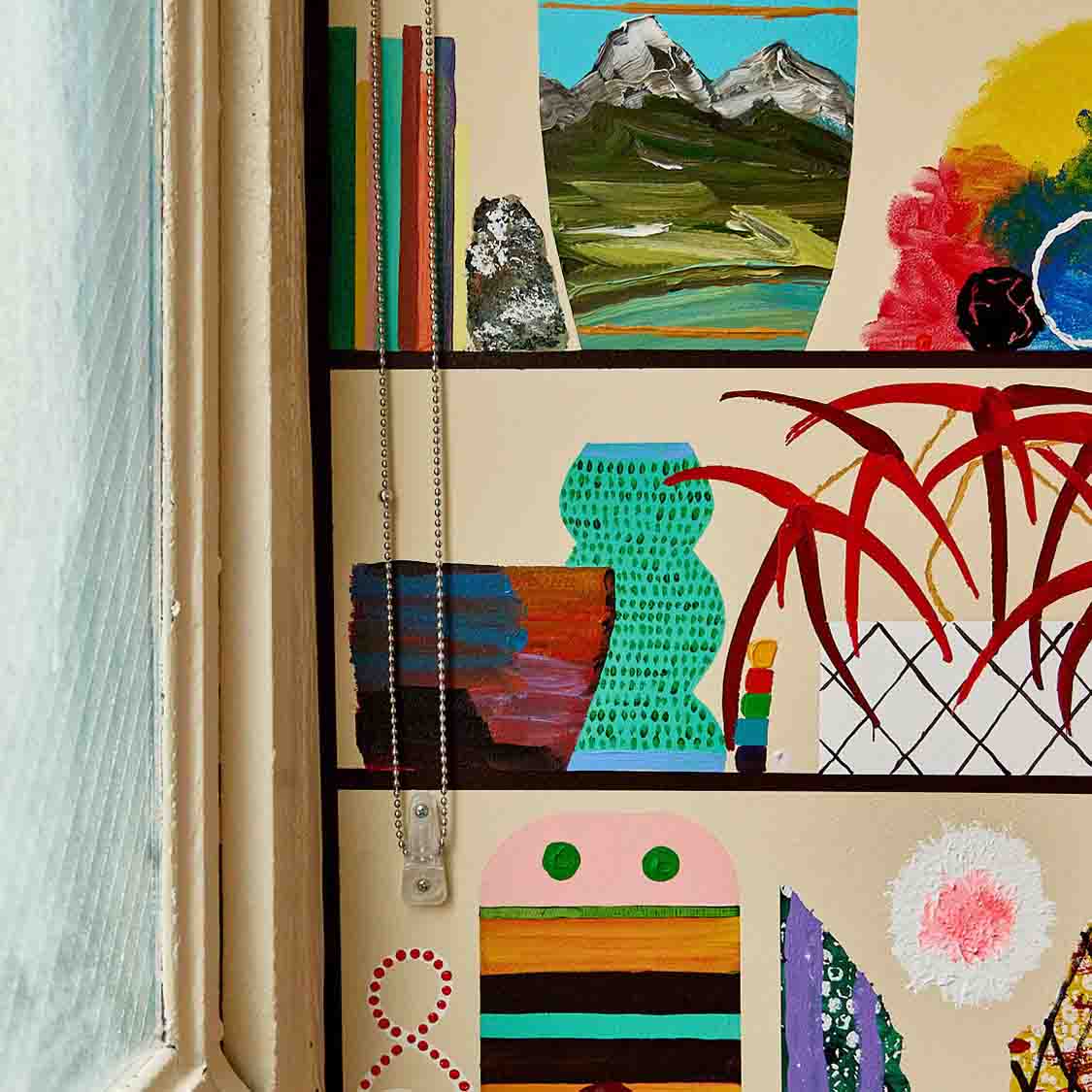 a group of paintings on a wall
