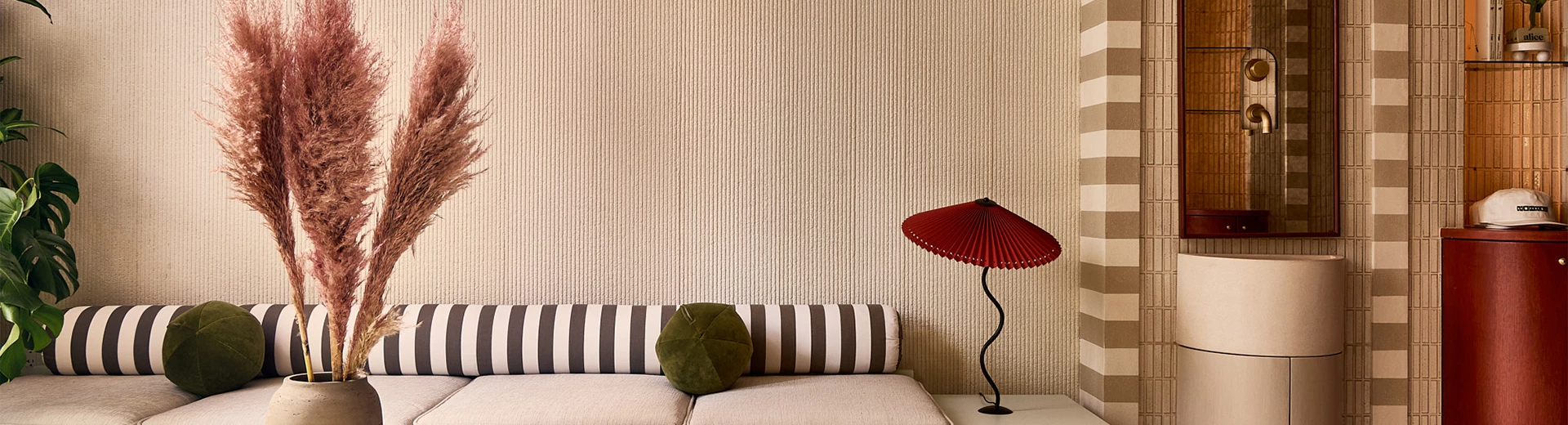 a lamp next to a couch