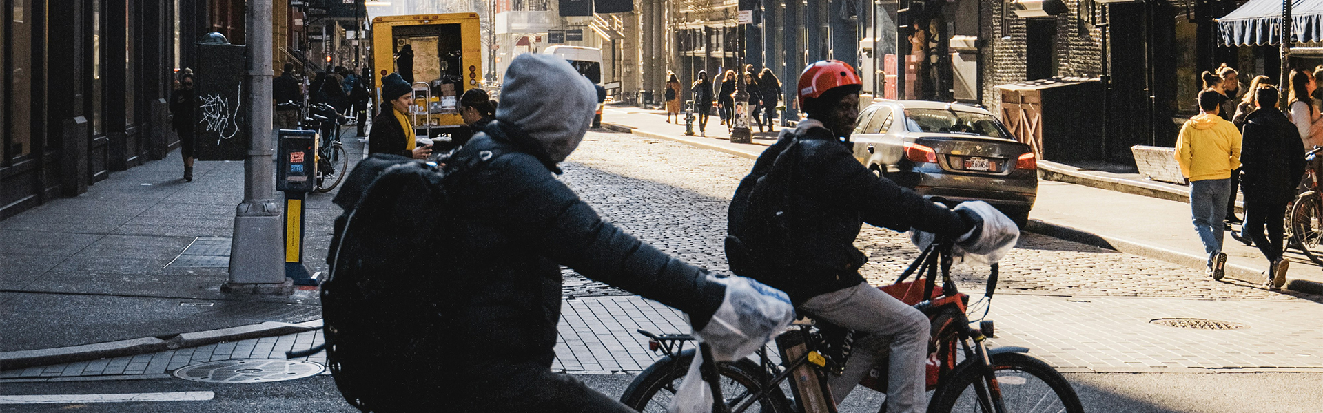 a man riding a bicycle on a street