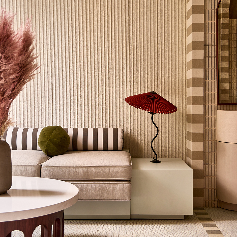 a living room with a couch and a table