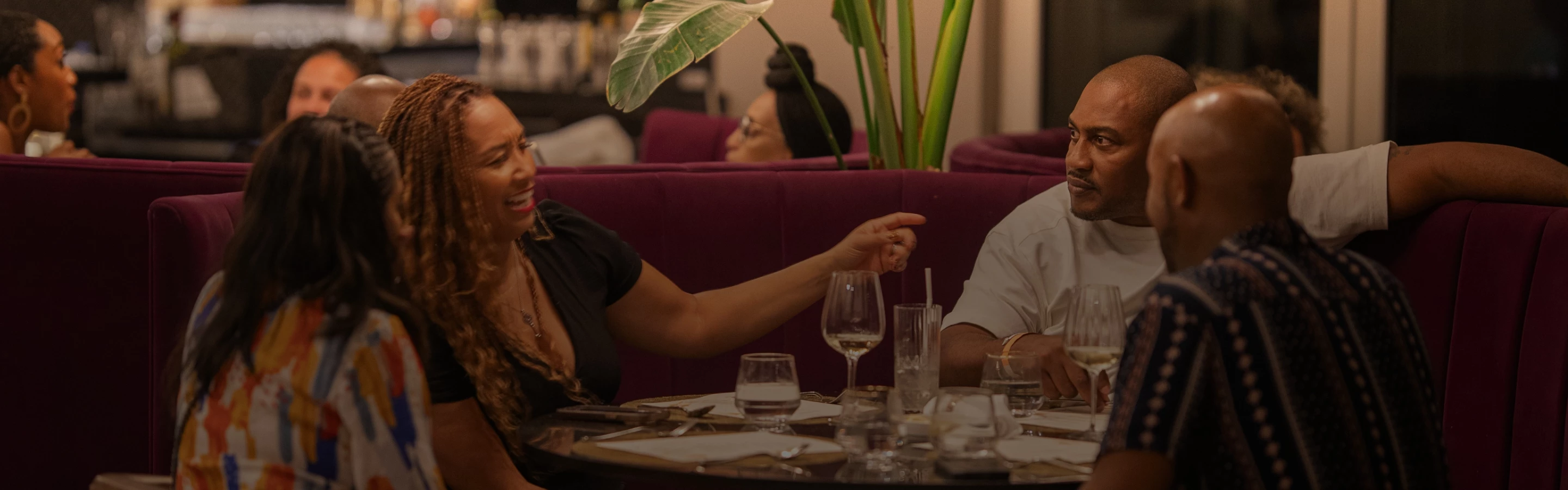 a man and woman sitting at a table