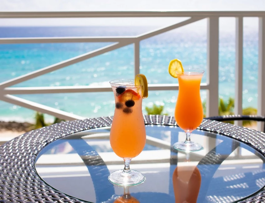 two tropical orange cocktails