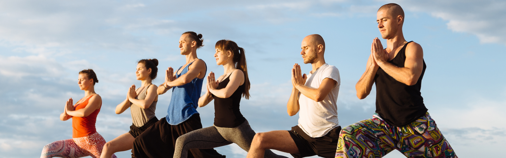 a group of people doing yoga
