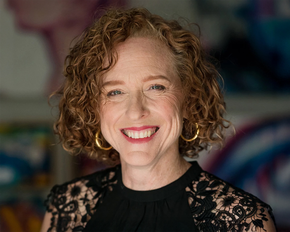 a woman smiling at camera