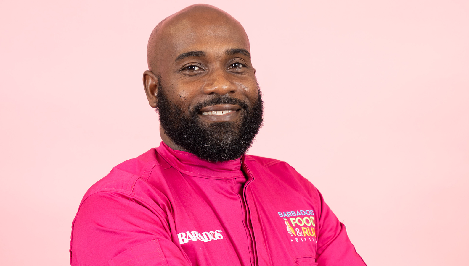 a man in a pink jacket