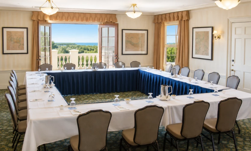 a room with a table and chairs