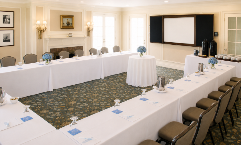 a room with tables and chairs