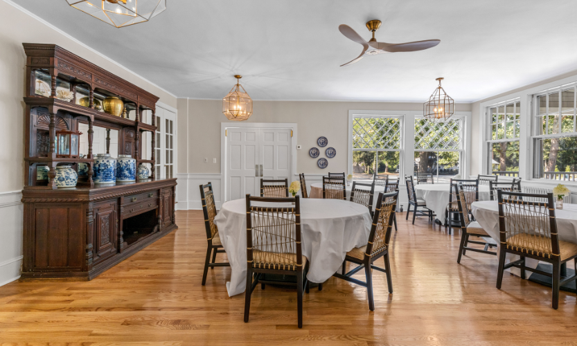 a room with a table and chairs