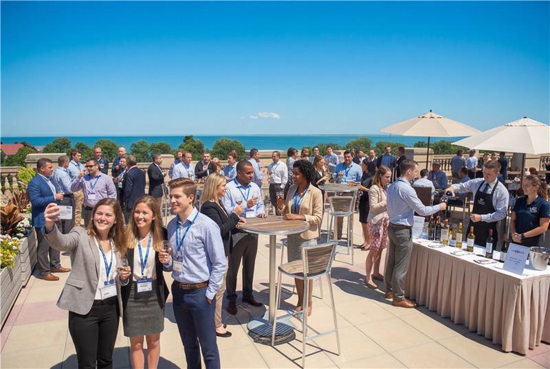 a group of people standing outside at Ocean Terrace