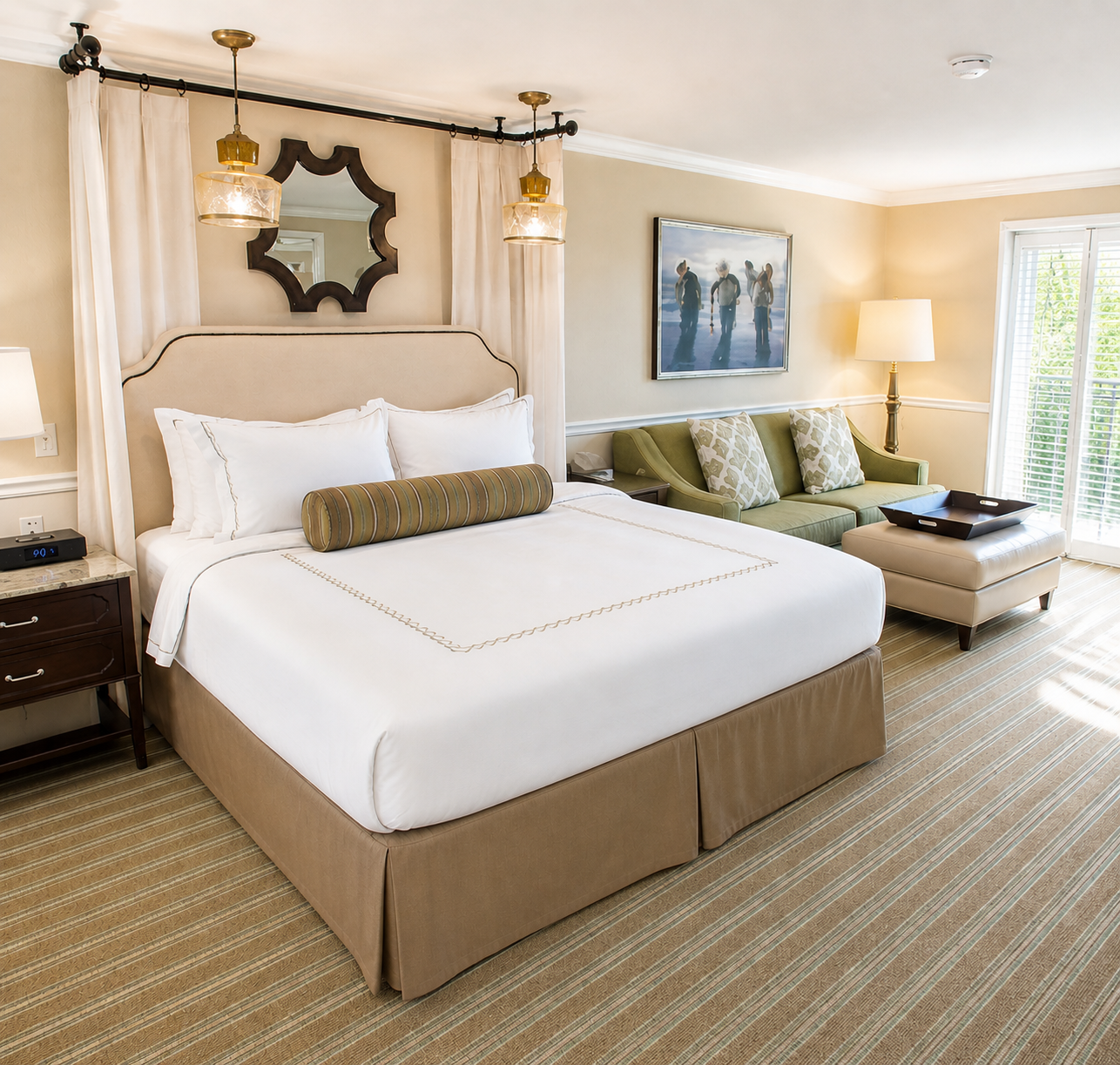 a bedroom with a bed and a couch