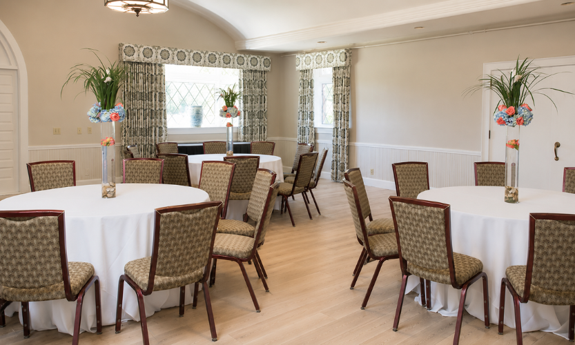 a room with tables and chairs