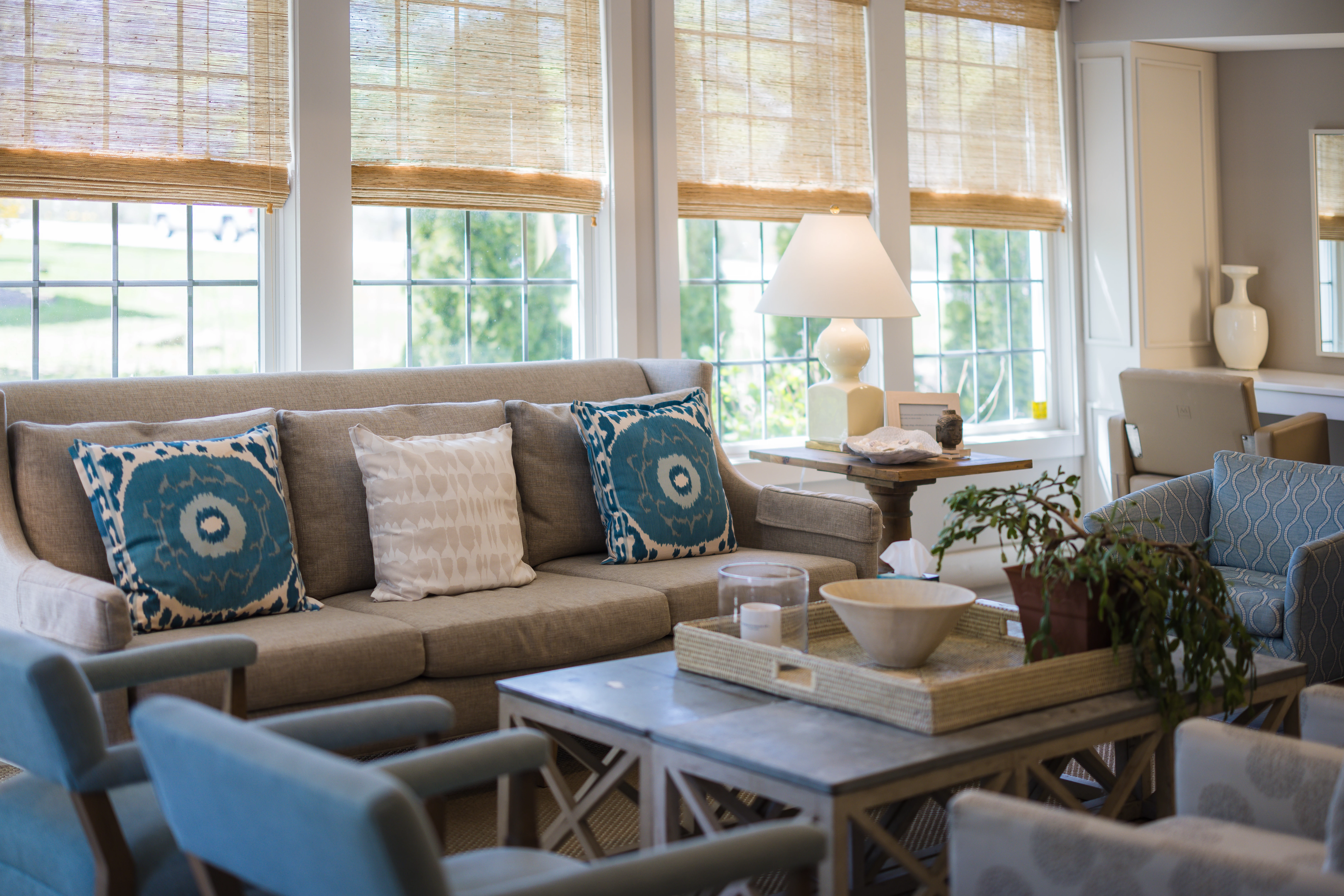 a living room with a couch and a table