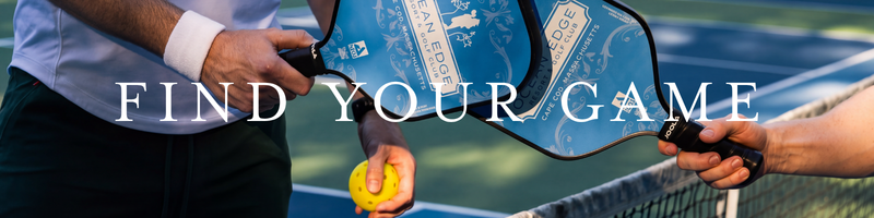 a person holding a paddle and a yellow ball