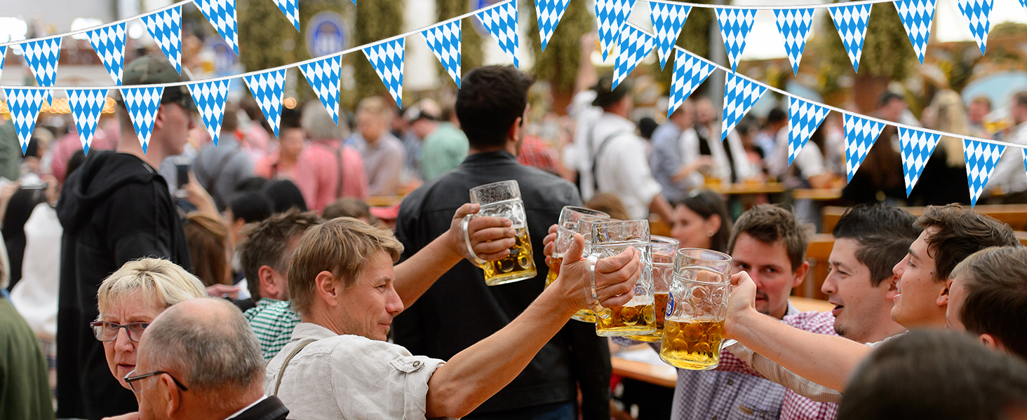 a group of people holding glasses of beer