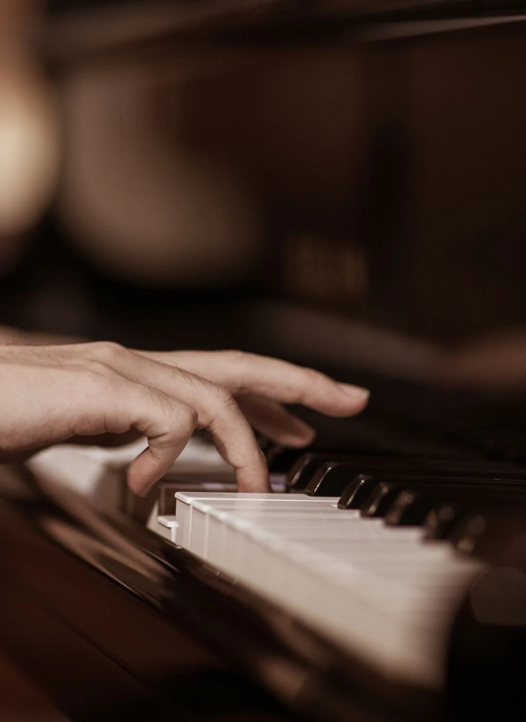 a person playing a piano