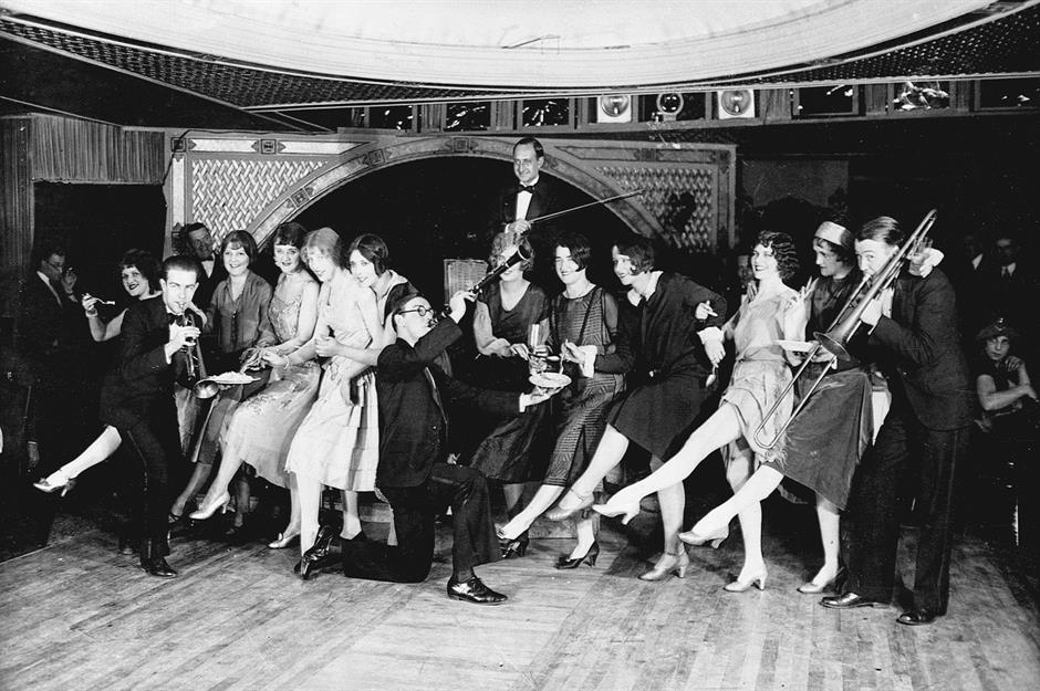 a group of people sitting on a stage
