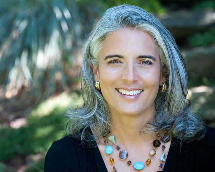 a woman smiling at camera