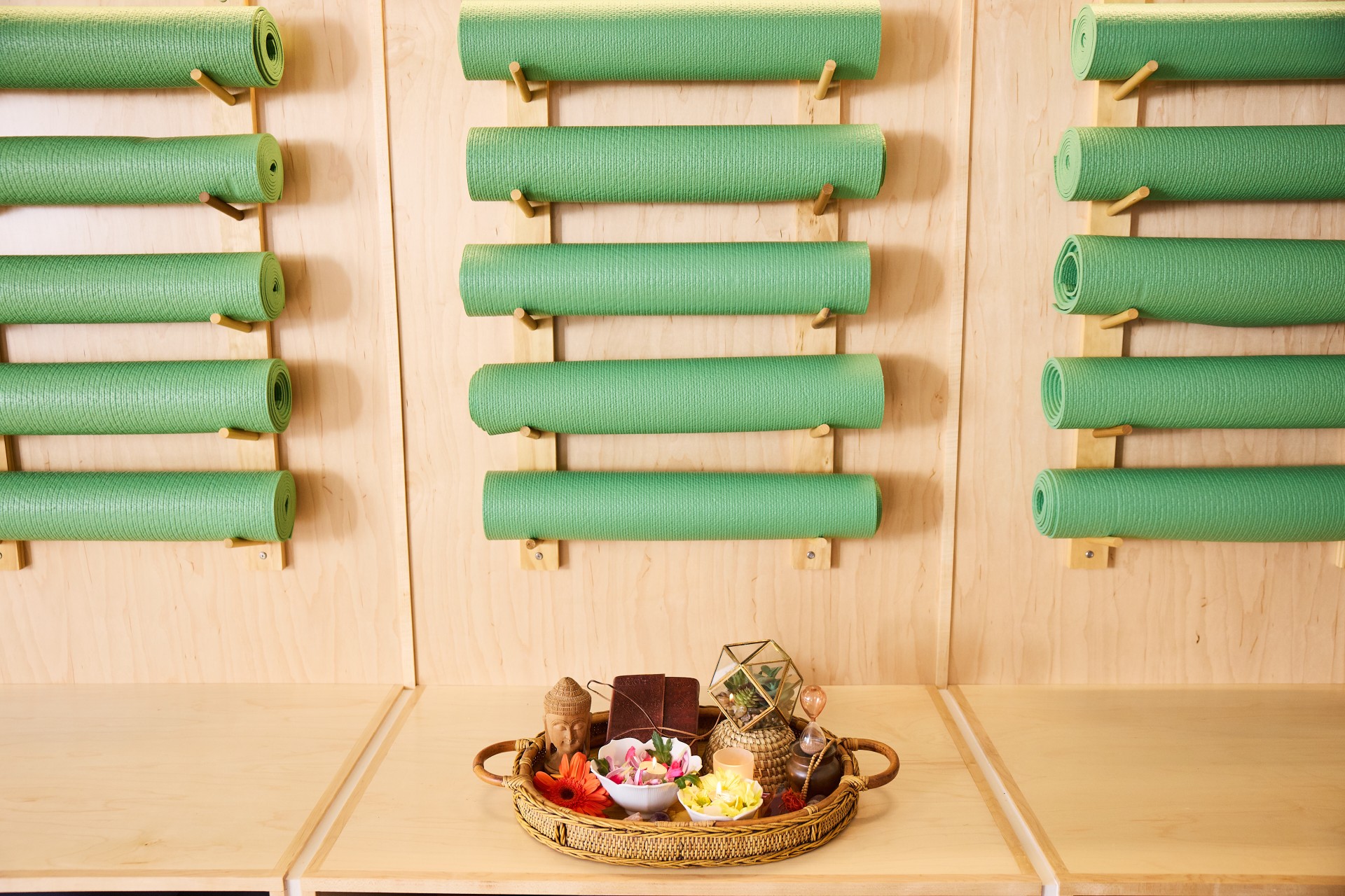 a tray of food and other objects on a wall