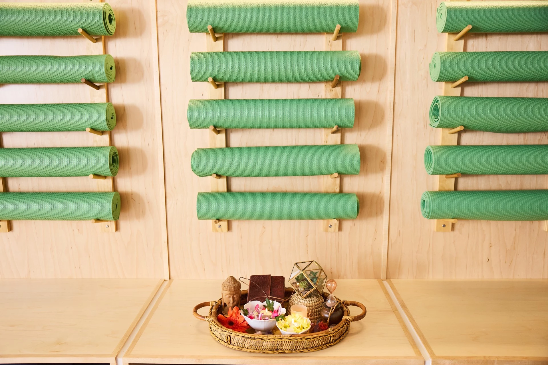 a tray of food and other objects on a wall