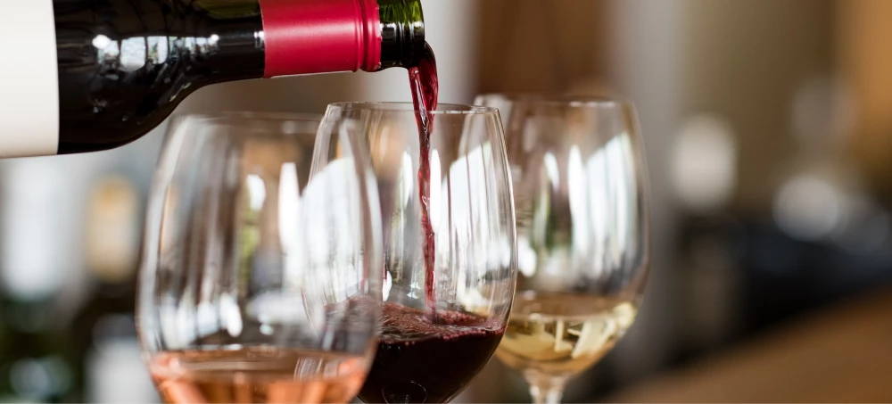 wine being poured into glasses