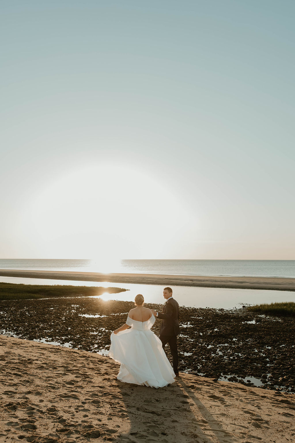 bride and groom cutting cake