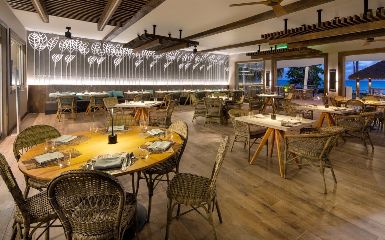 indoor dining restaurant with straw chairs