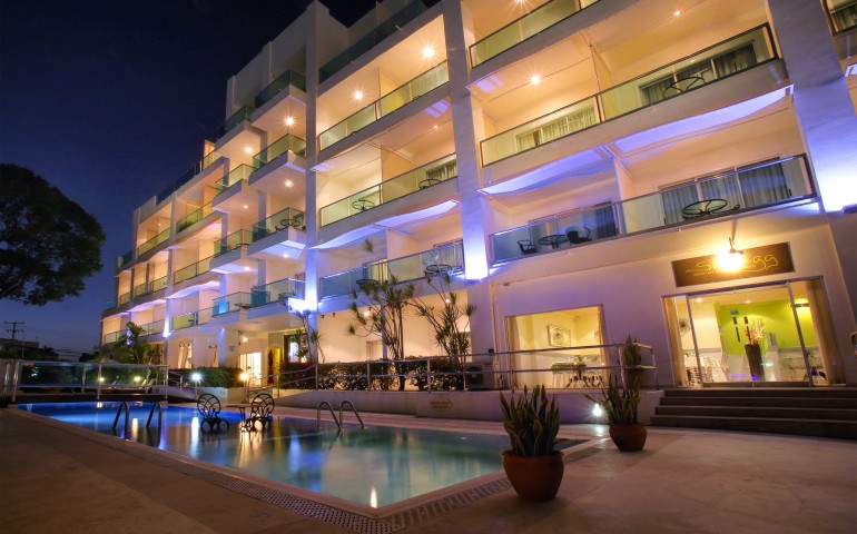 back exterior of south beach hotel and pool