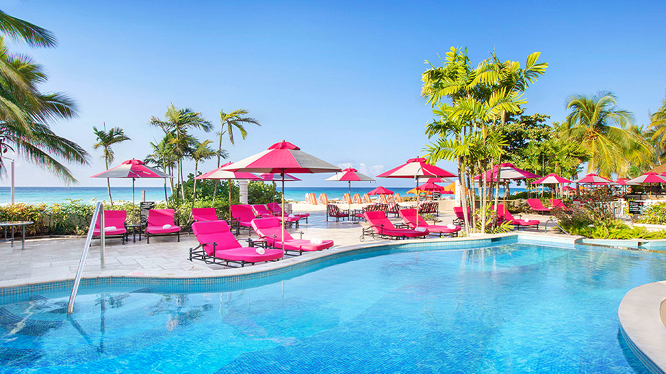 pink lounge chairs by the pool
