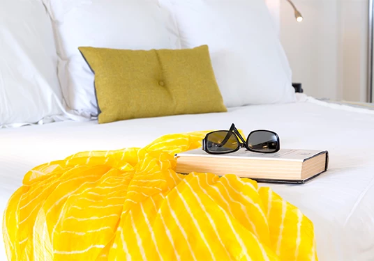 a pair of sunglasses on a book