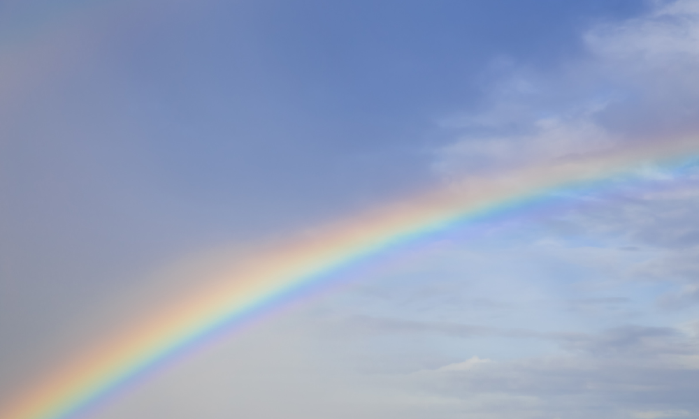 a rainbow in the sky