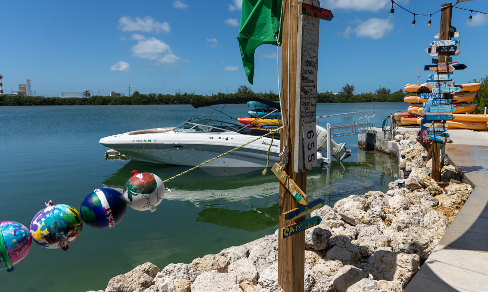 a boat tied to a pole
