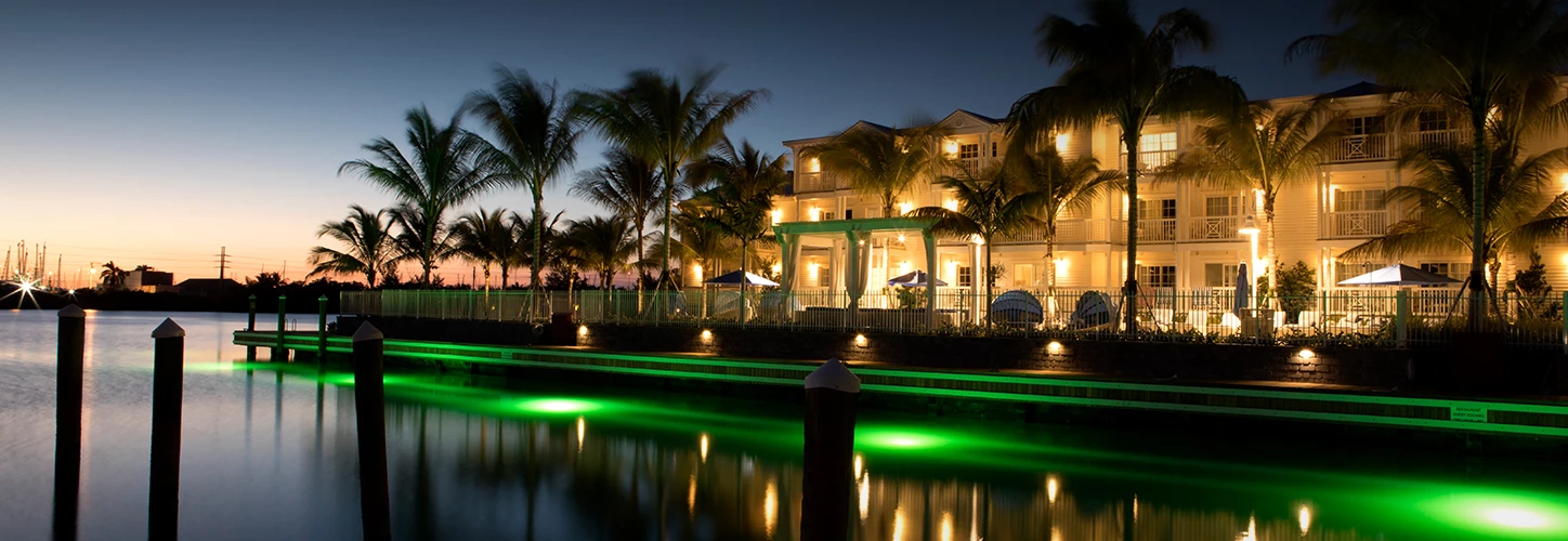 panoramic exterior view of the property at night 