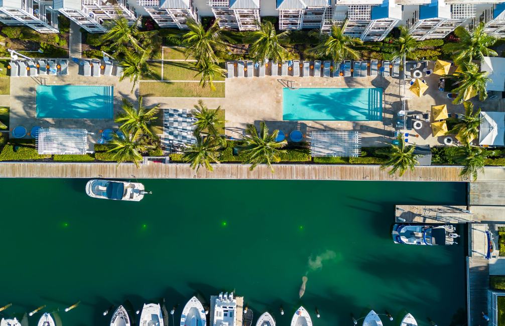a pool and boats in a body of water