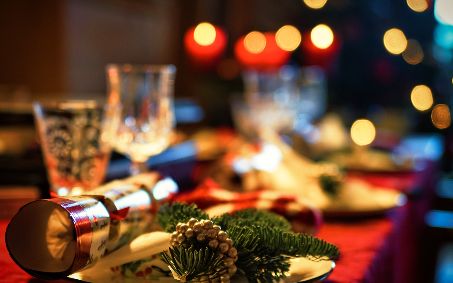 a table with a plate and a gift box