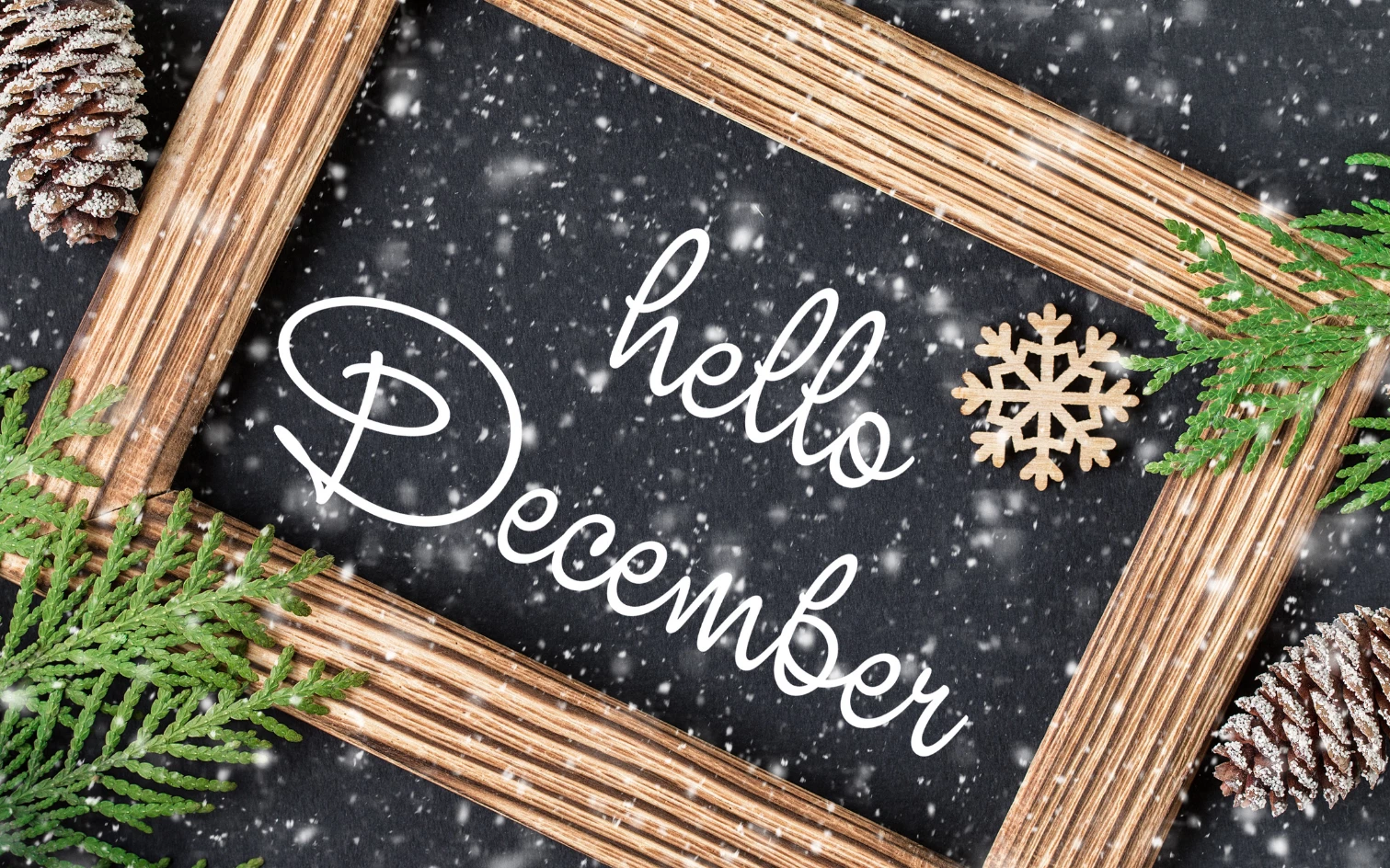 a black board with a black background with snowflakes and a snowflake